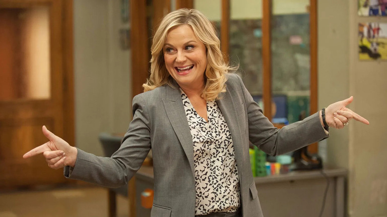 Leslie doing finger guns and smiling on Parks and Recreation