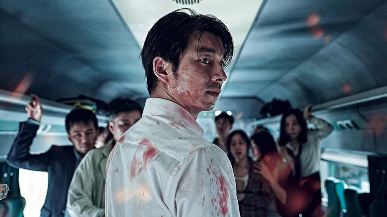 Seok-woo and the survivors in "Train to Busan" (2016)