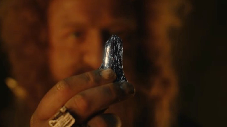 Durin IV holds up mithril in "The Rings of Power" (2022-present)