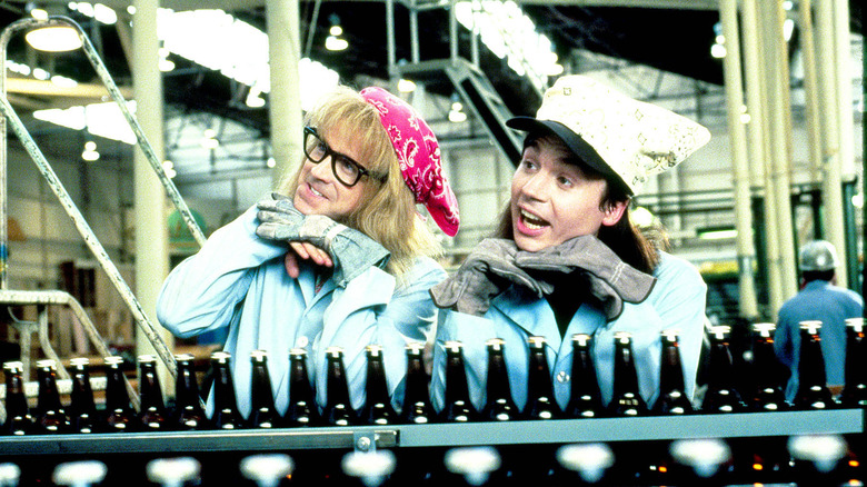 Garth and Wayne at the bottling factory in Wayne's World (1992)