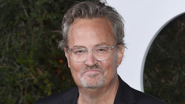 Matthew Perry wearing glasses