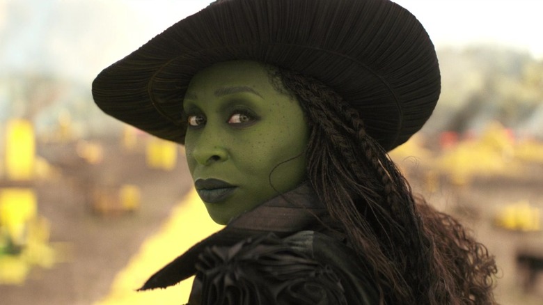 Elphaba stands on the Yellow Brick Road in 