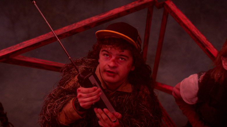 Dustin looking up at danger in "Stranger Things" (2025)