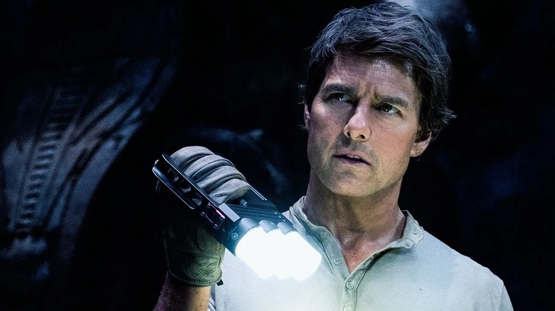 Nick Morton inspecting an ancient artifact in The Mummy (2017)