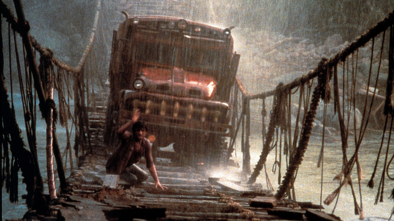 A truck drives over a collapsing bridge in "Sorcerer" (1977)