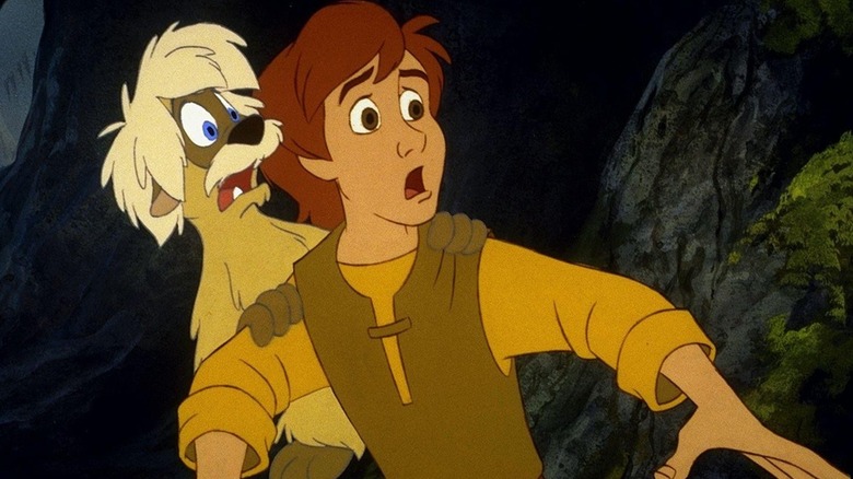 Gurgi clinging to the back of Taran in The Black Cauldron (1985)