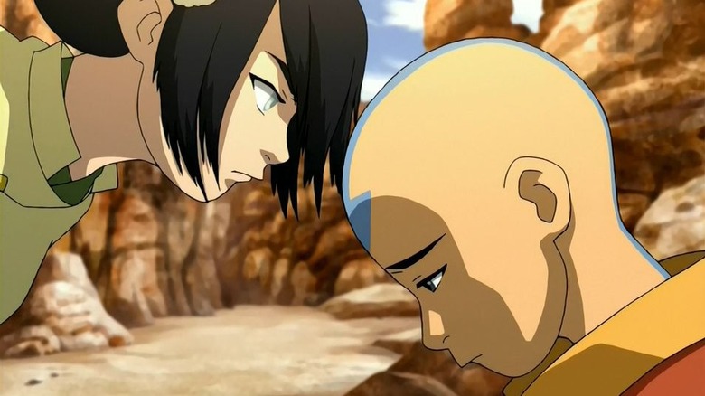 Toph scowling at a sad Aang in "Avatar: The Last Airbender" (2005)