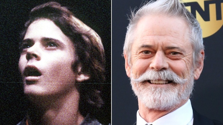 Tyler from E.T. looking up and C. Thomas Howell smiling