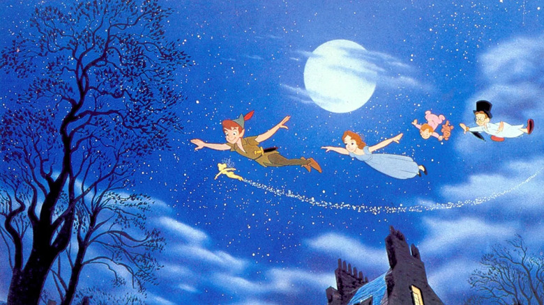 Peter and Tinkerbell leading the Darling children through the air in Peter Pan