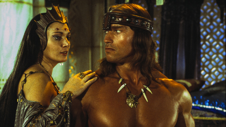 Queen Taramis touches Conan's shoulder in "Conan the Destroyer" (1984)