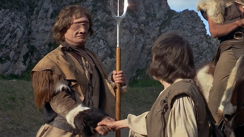 Rell the Cyclops shakes hands with someone in "Krull" (1983)