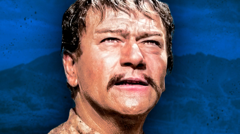 John Wayne wearing a little mustache as Genghis Khan
