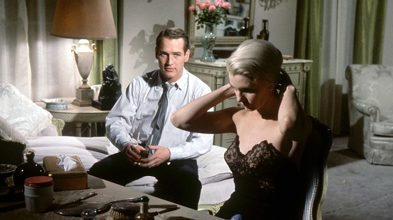 Alfred Eaton watching his lady friend get ready in From the Terrace (1960)