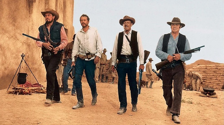 Four of the leads of The Wild Bunch preparing to unleash chaos (1969)