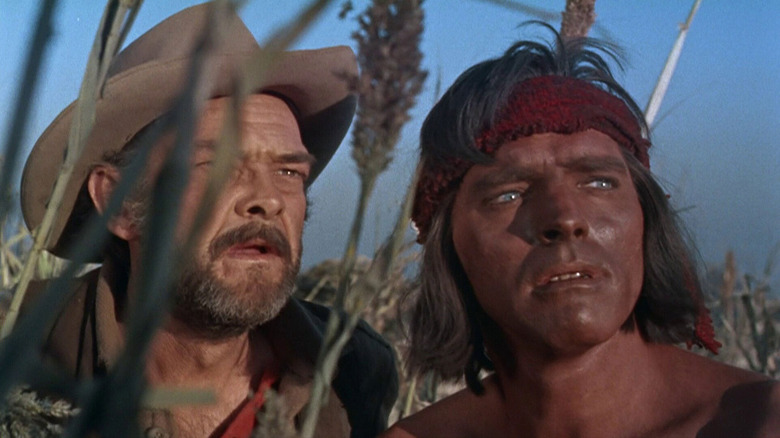 Massai hides in the weeds with Lt. Col. Beck in "Apache" (1954)