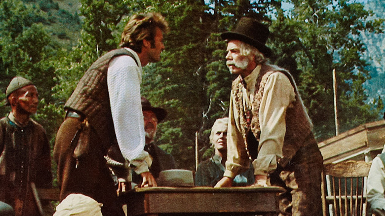 Pardner and Ben Rumsen face off across a table in "Paint Your Wagon" (1969)