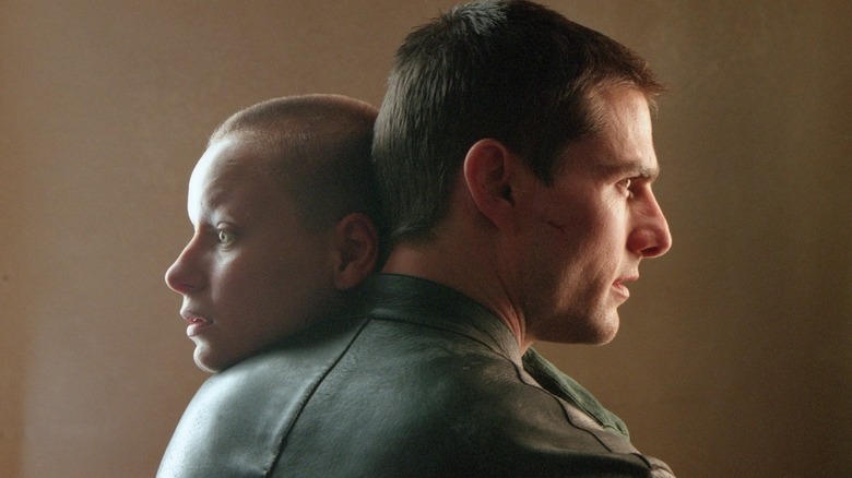 John Anderton clutching a precog close in Minority Report (2002)
