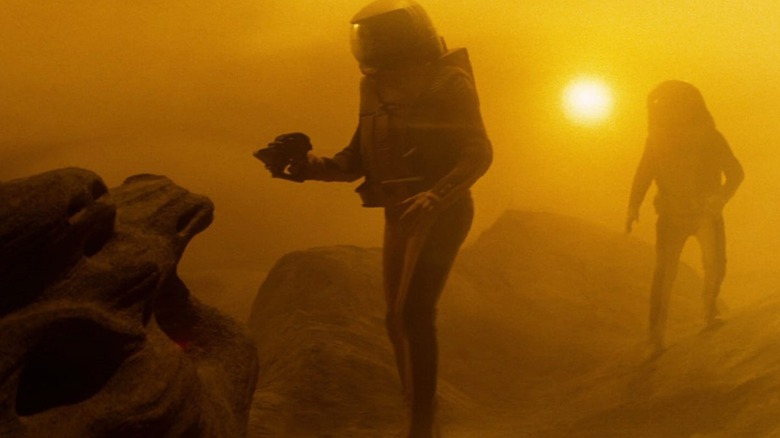 Two Starfleet personnel walking on Ceti Alpha V in "Star Trek II: The Wrath of Khan"