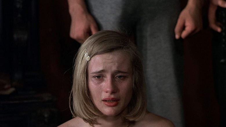 A young woman cries while being tortured in "Salò, or the 120 Days of Sodom"