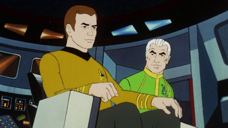 Admiral April stands behind Kirk on the bridge in Star Trek: The Animated Series