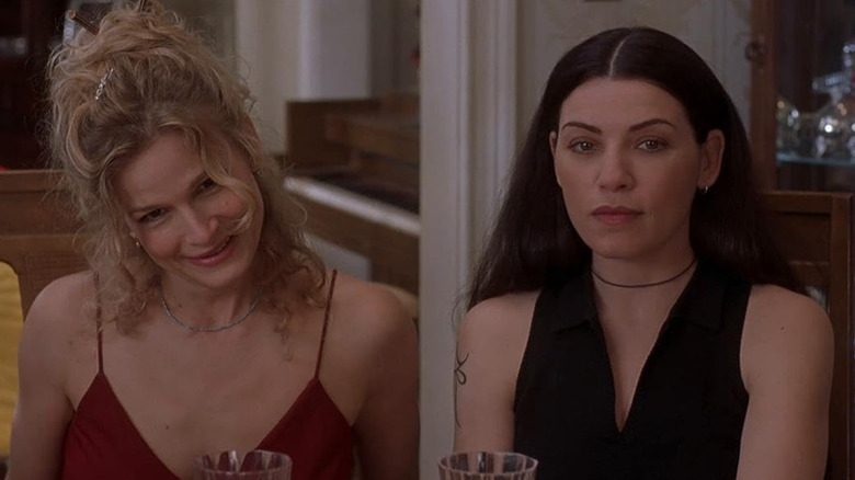 Rachel and Carla sitting together at a table in "What's Cooking?" (2000)
