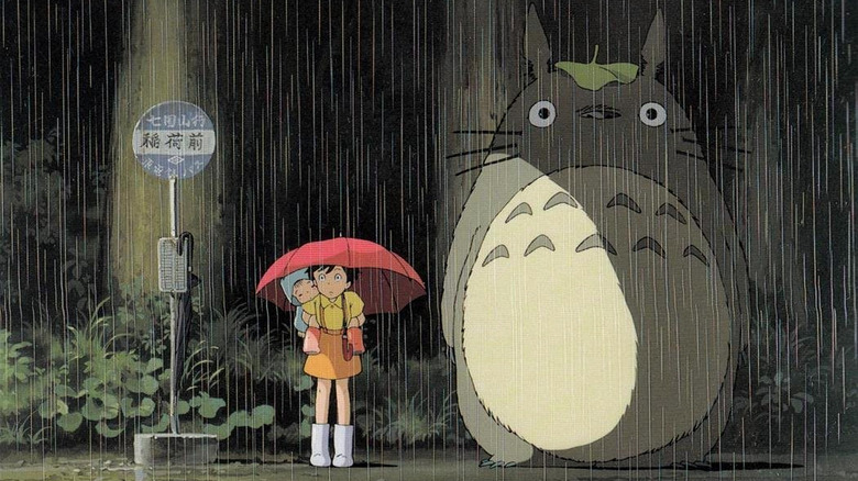 Mei and Satsuki wait with Totoro for the Cat Bus in My Neighbor Totoro (1988)
