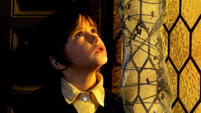 Ana looking for spirits out of the window in Spirit of the Beehive (1973)