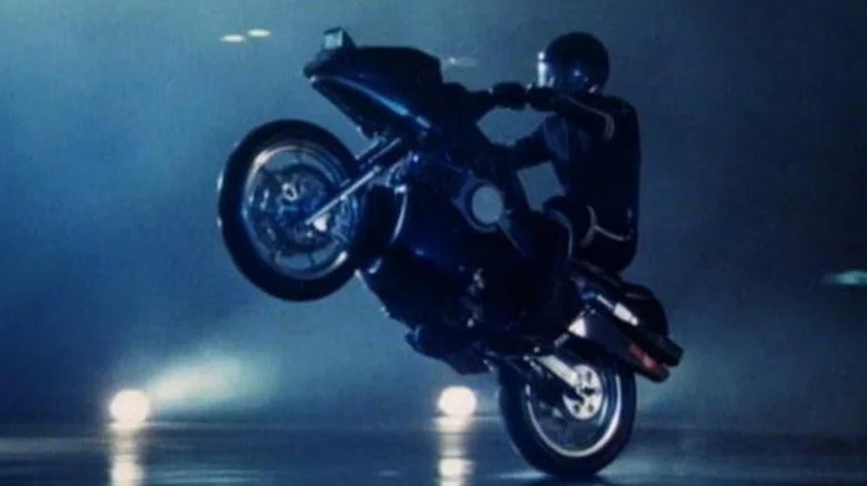 Jesse Mach pulling a motorcycle wheelie on Street Hawk