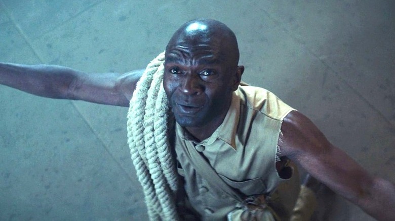 Man with a long rope cries