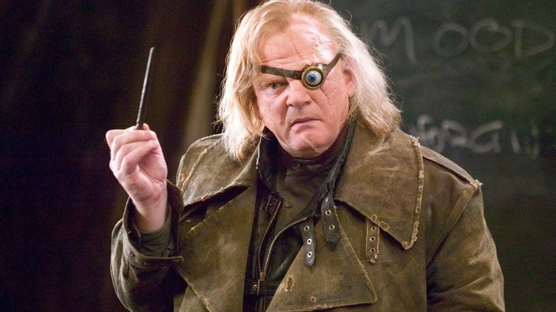 Alastor Moody holding his wand in "Harry Potter and the Goblet of Fire."
