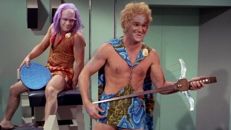 Adam and Tongo Rad playing musical instruments in Star Trek: The Original Series