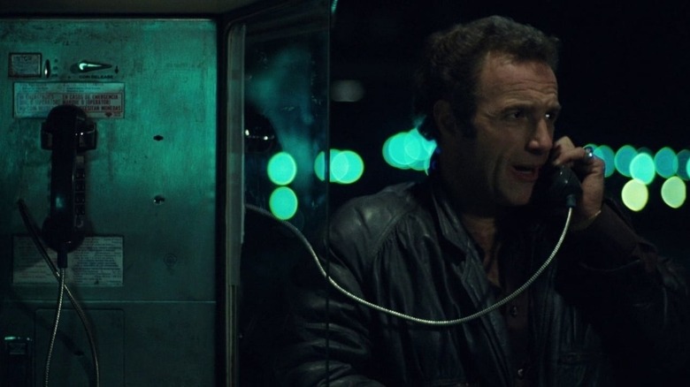 Frank on an intense phone call in Thief (1981)