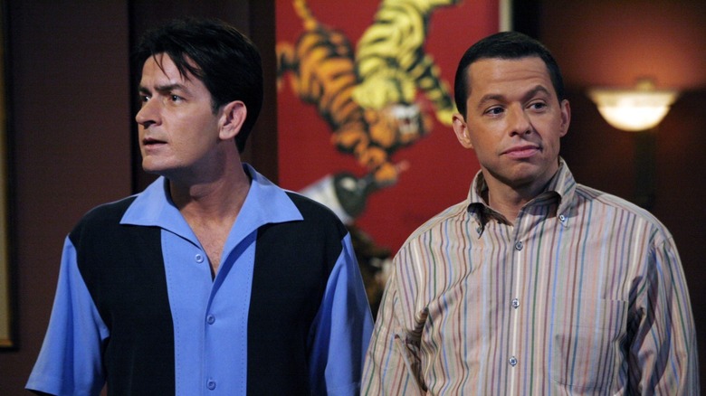 Charlie and Alan Harper enter a restaurant in "Two and a Half Men"