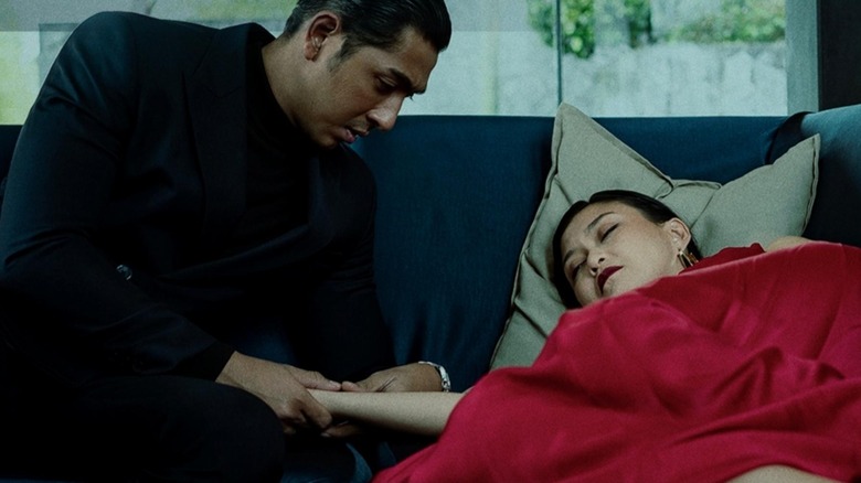 Jefri strokes Sofia's hand in Dendam Malam Kelam (2025)