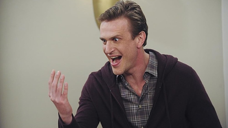 Marshall laughing maniacally at his hand on How I Met Your Mother