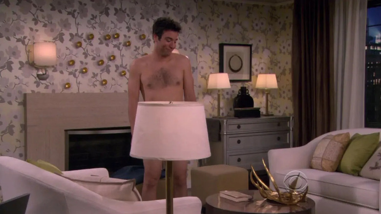 Ted standing naked in Vicky's apartment on How I Met Your Mother