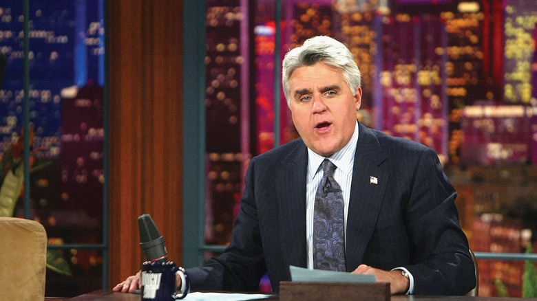 Jay Leno behind Tonight Show desk