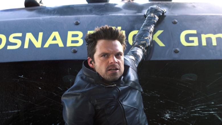 Bucky Barnes hanging onto the side of the vehicle in "The Falcon and the Winter Soldier" (2021)