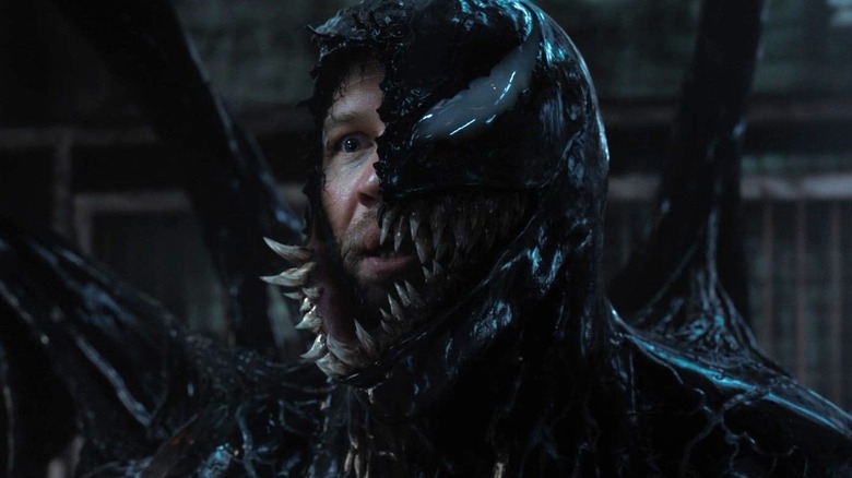 Eddie Brock and Venom merging in "Venom: The Last Dance" (2024)