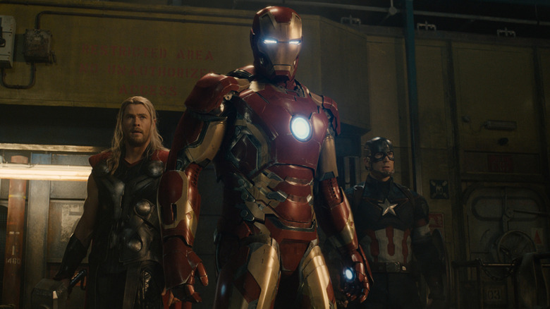 Thor, Iron Man, and Captain America ready for battle in "Avengers: Age of Ultron" (2015)