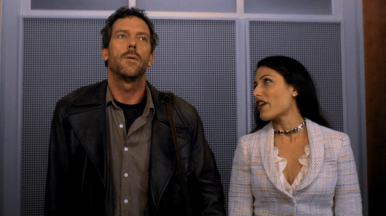 Cuddy talking to House as they ride an elevator in House, M.D. (2004)