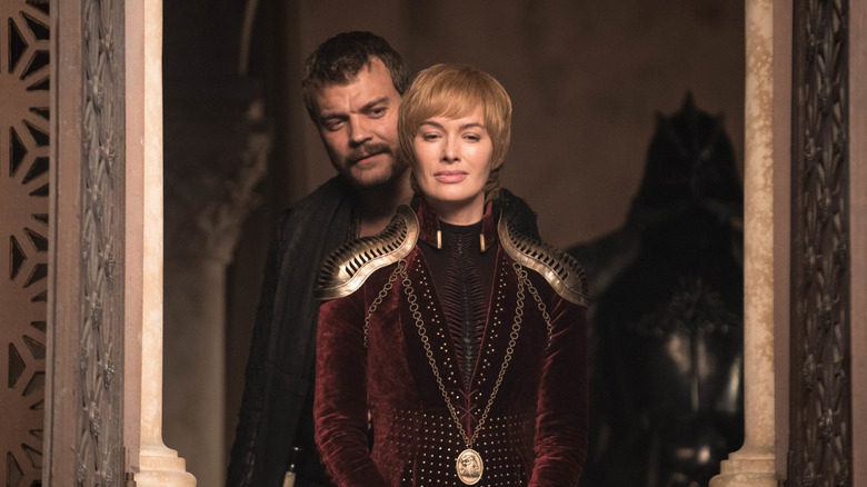 Euron standing beside Cersei who is smirking