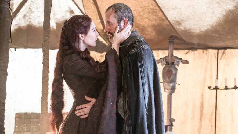Melisandre caressing Stannis in a Baratheon tent on Game of Thrones