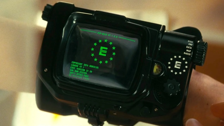 A Pip Boy displaying the Enclave logo in "Fallout" Season 2