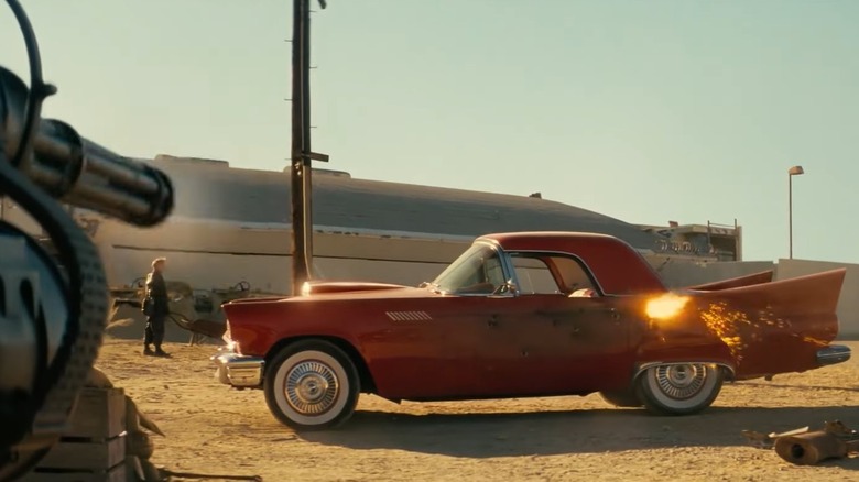 Brotherhood Knights shooting at red car in "Fallout" Season 2