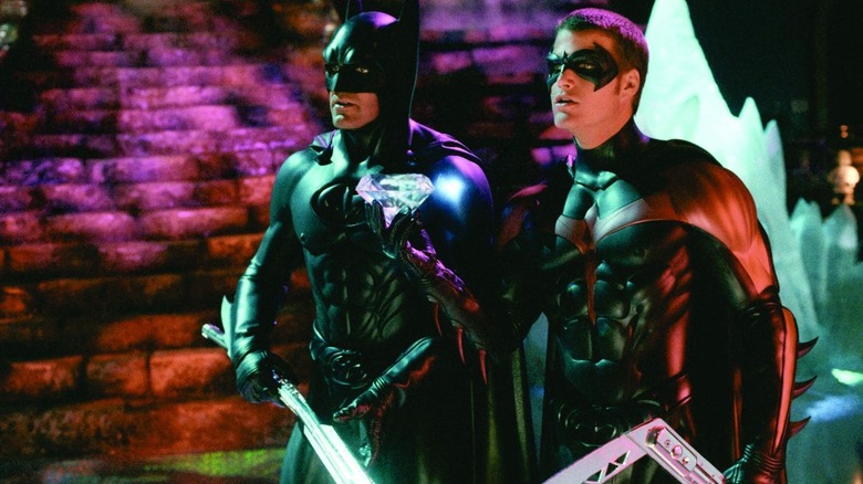 Batman and Robin presenting their diamond find in Batman & Robin (1997)
