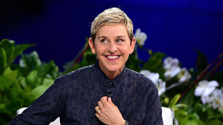 Ellen DeGeneres smiling on the set of "The Ellen DeGeneres Show"