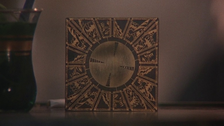 The Lament Configuration puzzle box sitting on a shelf in "Hellraiser"