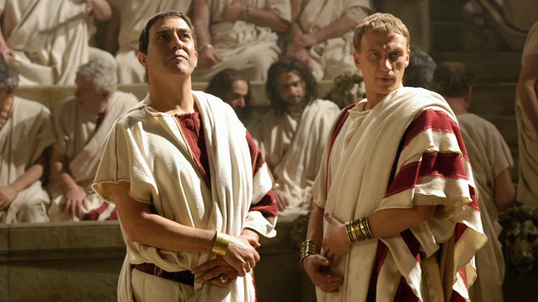 Julius and Lucius looking at someone in Rome