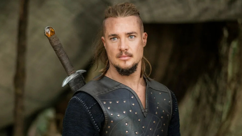 Uthred looking at something on The Last Kingdom